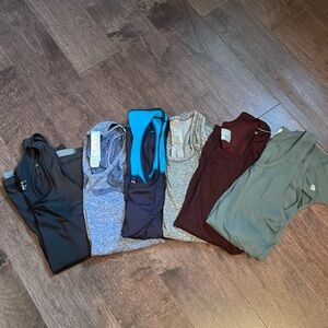 Set of assorted six athletic tank tops. XS
